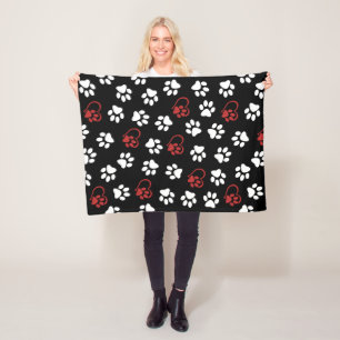 Patroon van poten, witte poten, rode poten, harten fleece deken