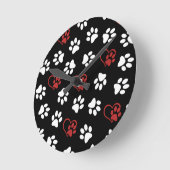 Patroon van poten, witte poten, rode poten, harten ronde klok (Hoek)