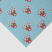 Patroon van twee rode en witte snoepjes op blauw tissuepapier (Detail)