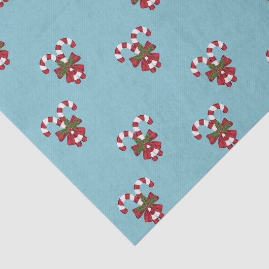 Patroon van twee rode en witte snoepjes op blauw tissuepapier (Detail)