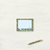 Pauwveren & kalligrafie op lichtblauw post-it® notes (Op bureau)