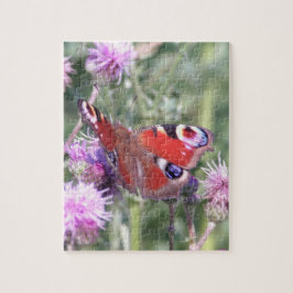Pauwvlinder in zomerse zonneschijn legpuzzel