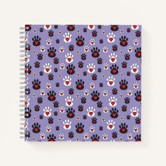 Paw Prints met rode harten op blauw Notitieboek