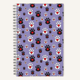 Pawprints met rode harten op blauw notitieboek