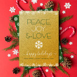 Peace Joy Love Typography Snowflake Gold Glitter Feestdagenkaart<br><div class="desc">"Vrede, vreugde en liefde." Een leuke, speelse, witte sneeuwvlokillustratie en moderne typografie op een dunne, faux gouden achtergrond helpen je in het vakantieseizoen te werken. Witte sneeuwvlokken en confetti stippen lijsten de kaart. Een wit sneeuwvlokpatroon bedekt donkergroen op de rug. Voel de warmte en de vreugde van de feestdagen wanneer...</div>
