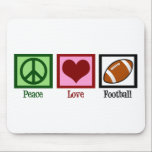 Peace Love Football Muismat<br><div class="desc">Een  vredesteken,  hart en een football cadeau voor een coach om zijn teamspelers te laten passeren. Een football moeder mousepad is een geweldige manier om computer en sport te combineren.</div>