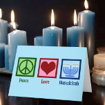 Peace Love Hanukkah Feestdagen Kaart<br><div class="desc">Peace Love Chanoeka kaarten voor een Joodse familie die graag Chanoeka viert. Een  vredesteken,  hart en een prachtige menora op een blauwe kaart om naar vrienden en familie te sturen.</div>