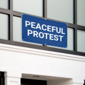 Peaceful Protest Banner (Buitenkant Gebouw)
