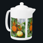 PEACHES THEEPOT<br><div class="desc">Een artistieke waterverf van perziken die op de boom groeien.</div>