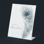 Peacock Feather Gastenboek Bruiloft Reclamebord Met Voetstuk<br><div class="desc">Peacock Feather Gastenboek Bruiloft Pedestal teken. De tekst kan eenvoudig worden aangepast aan uw woorden.</div>