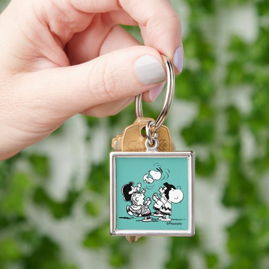 Peanuts Gang Lifting Snoopy Sleutelhanger (Hand)