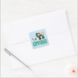 Peanuts | Kerstmis is de vreugde van het geven Vierkante Sticker<br><div class="desc">Bekijk dit leuke Peanuts Christmas-ontwerp.</div>