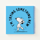Peanuts | Snoopy probeert iets nieuws Notitieboek (Achterkant)