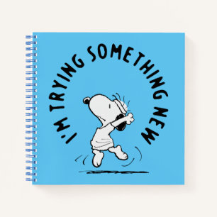 Peanuts   Snoopy probeert iets nieuws Notitieboek