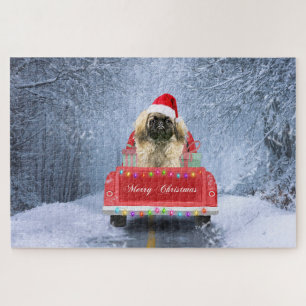 Pekingees in de Sneeuw zittend in Kersttruck Legpuzzel