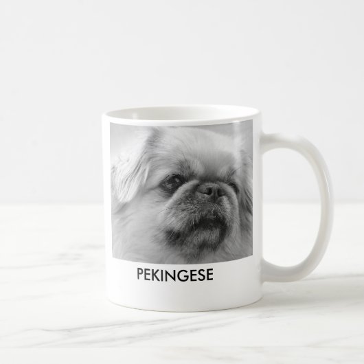 Pekingese, aangeboren en met rode b.. koffiemok (Rechts)