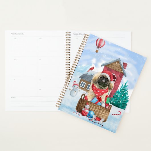 Pekingese hond op sneeuwkerstmis planner (Display)