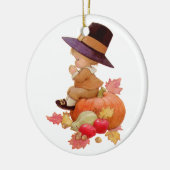  pelgrimjongen die op pompoen bidt keramisch ornament (Links)