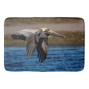 Pelican in vlucht badmat