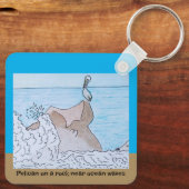 Pelikaan op een rots in de buurt van oceaangolven sleutelhanger (Achterkant)