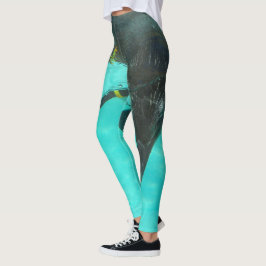 Penguin duikt in blauw water op leggings