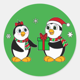Penguin geeft zijn vriend een kerstcadeau ronde sticker