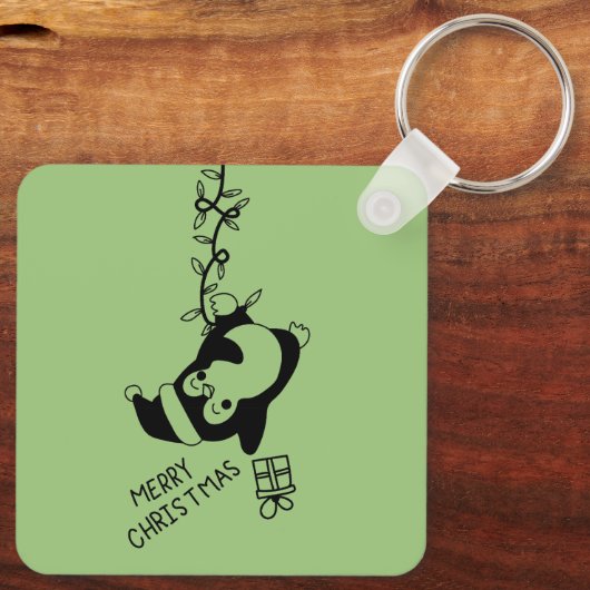 Penguine distributing christmas gifts sleutelhanger (Achterkant)
