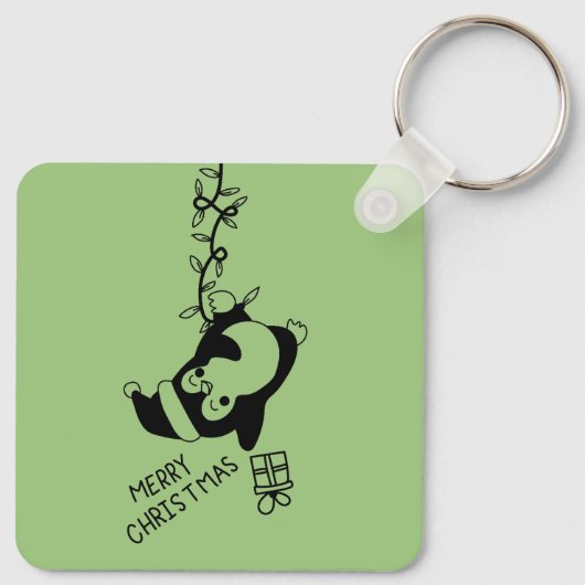 Penguine distributing christmas gifts sleutelhanger (Achterkant)