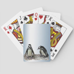 Penguins die kaarten afspelen