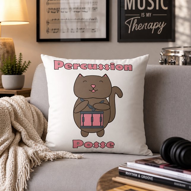 Percussion Posse - Schattige Drummer Kat Kussen (A throw pillow with a cute cat playing the drums and the text percussion posse.)