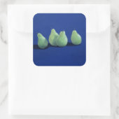 Peren op een blauwe doek vierkante sticker (Tas)