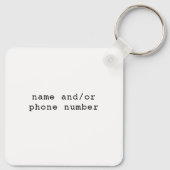 Perfect gebakken ei met scherpe randen en gouden j sleutelhanger (Achterkant)