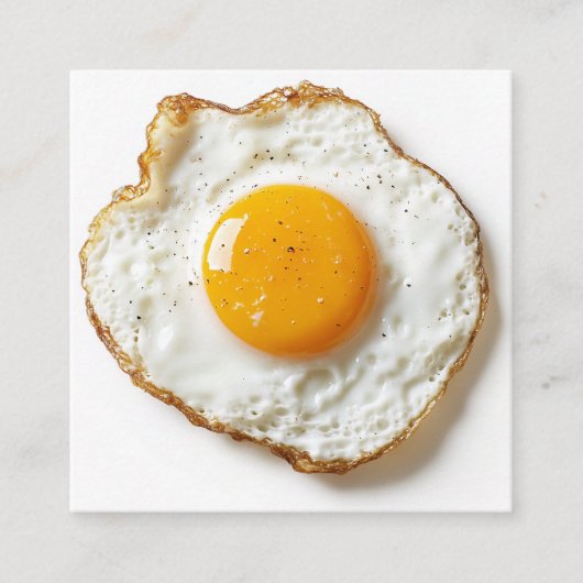 Perfect gebakken ei met scherpe randen en gouden j vierkante visitekaartje (Voorkant)