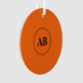 Persimmon oranje vaste kleur met monogram ornament (voorkant)