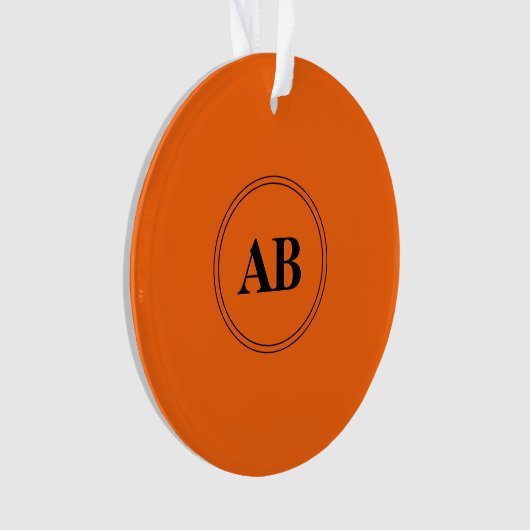 Persimmon oranje vaste kleur met monogram ornament (voorkant)
