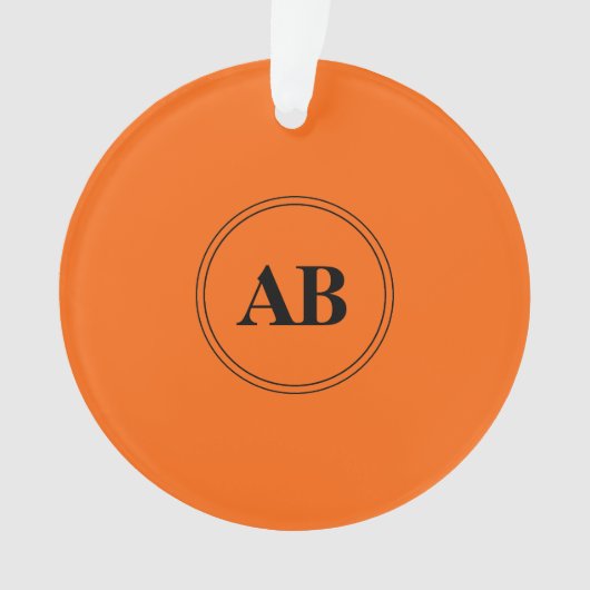 Persimmon oranje vaste kleur met monogram ornament (voorkant)