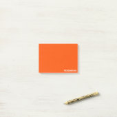 Persimmon rode kleurnaam post-it® notes (Op bureau)