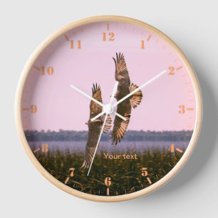 Personaliseer twee visarenden tijdens de vlucht