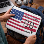 Personalized American Soccer Athlete Patriotic Laptop Sleeve<br><div class="desc">Keep your computer secure and stylish with this custom laptop sleeve featuring a high-impact USA soccer design. This protective sleeve is padded to shield your tech from bumps and scratches, featuring a secure zippered top for daily use. The vibrant stars and stripes background is personalized with your custom name and...</div>