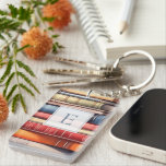 Personalized Book Lover Monogram Sleutelhanger<br><div class="desc">A charming book‑lover keychain featuring a colourful stack of illustrated book spines and a personalized monogram framed in a classic, literary style. Perfect for readers who want to carry a little piece of their bookish world wherever they go, this custom keychain adds warmth and personality to bags, keys, backpacks, and...</div>