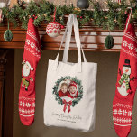 Personalized Christmas Wreath Tote Bag with Photo<br><div class="desc">"Carry holiday cheer wherever you go with this Red Stripe with Photo Merry Christmas and Name Personalized Tote Bag. Featuring a classic red stripe design, your custom photo, and a personalized name, this tote bag is both festive and functional. Perfect for gift-giving, holiday shopping, or everyday use, it’s a unique...</div>