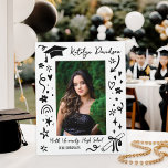 Personalized Doodle Graduation Photo Keepsake Fotoplaat<br><div class="desc">Celebrate your senior with this personalized graduation photo keepsake plaque featuring a fun, whimsical hand-drawn doodle border in a clean, modern style. The playful sketches include a grad cap, stars, sparkles, hearts, tiny flowers, curly squiggles, and a rolled diploma tied with a bow for a cheerful graduation vibe. Customize with...</div>