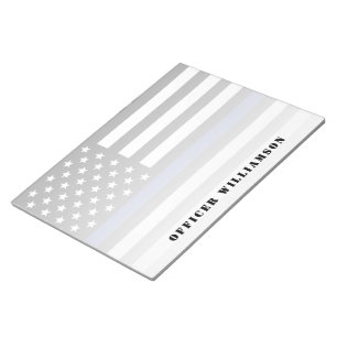 Personeel van de politie in de blauwe lijn notitieblok