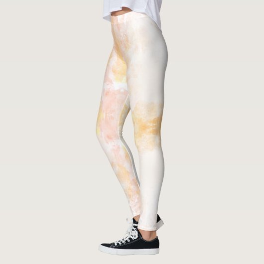 Persoon die leggings draagt met zachte pastel (Links)