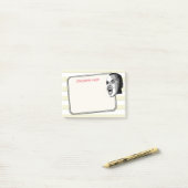 Persoon die op Pastel Gele Strepen om het even wel Post-it® Notes (Op bureau)