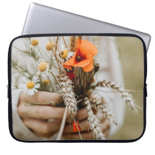 PERSOON HOLDING ORANJE GEPEALISEERDE STROOM LAPTOP SLEEVE