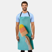 Persoon met gele en roze paprika schort (Gedragen)