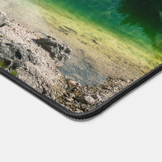 Persoon op het bergmeer bureaumat (Hoek)