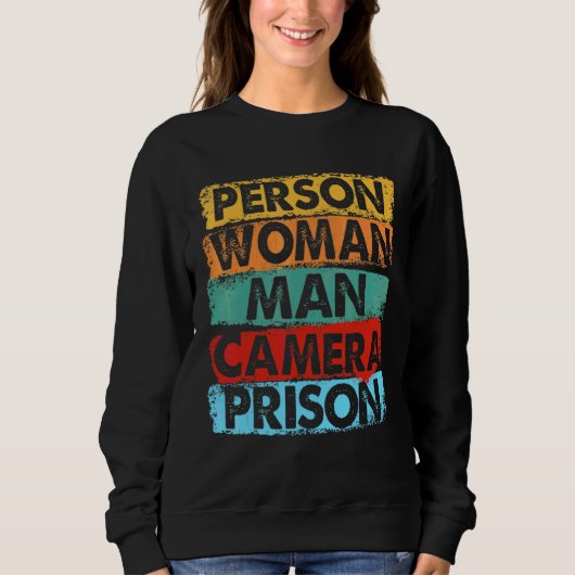 Persoon  Vrouw  Man  Camera  TV  Gevangenis   Trui (Voorkant)