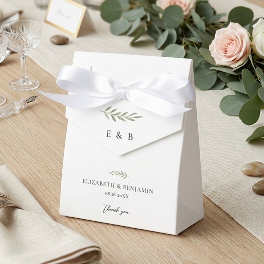 Persoonlijk botanisch trouwmonogram met groen bedankdoosjes